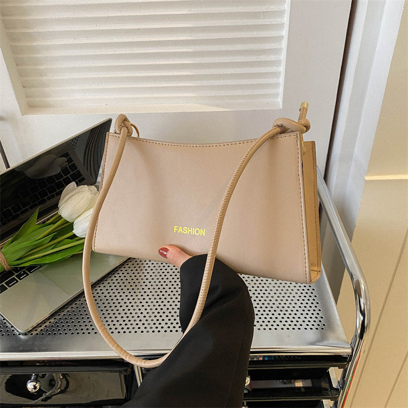 Candy-colored underarm bag