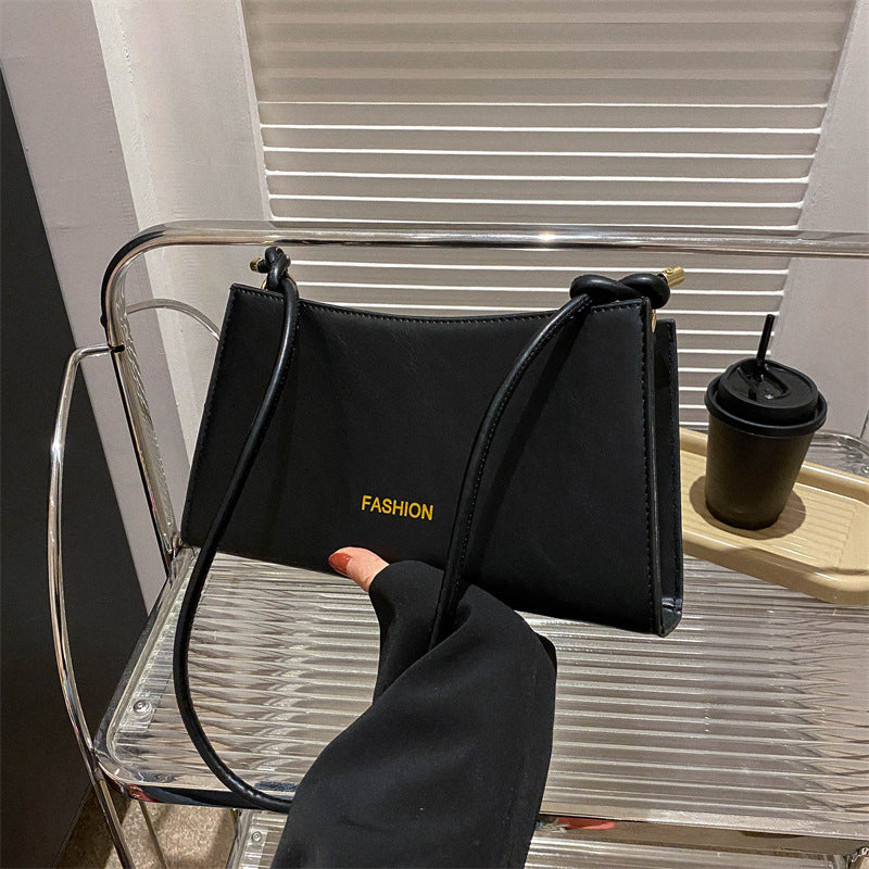 Candy-colored underarm bag