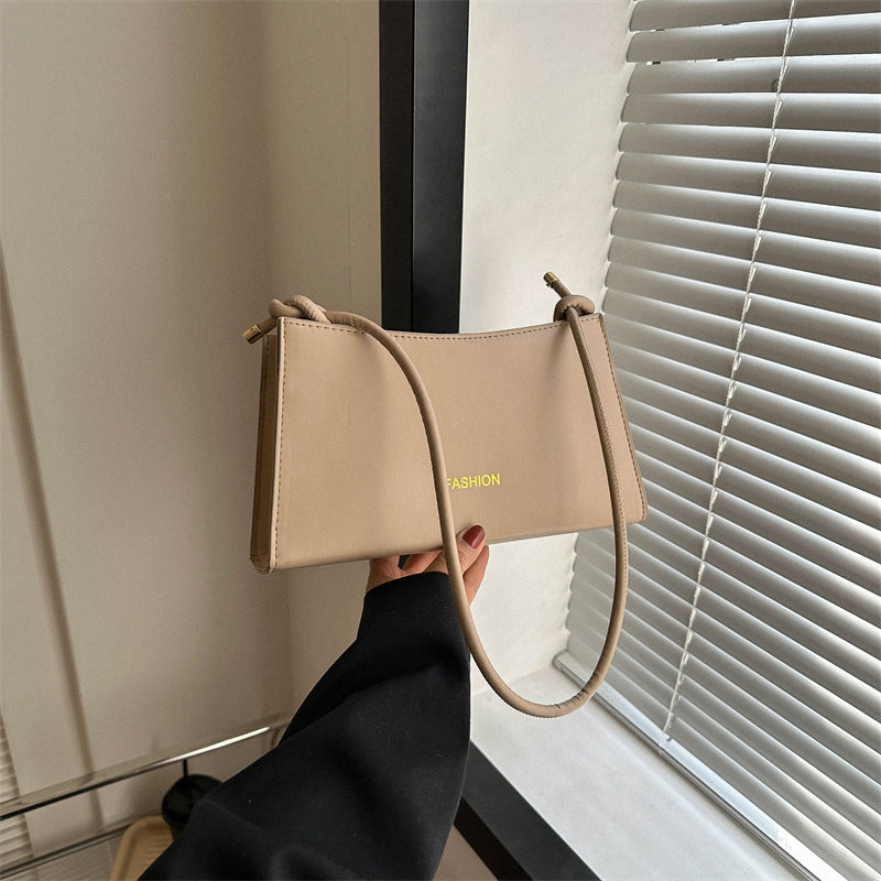 Candy-colored underarm bag