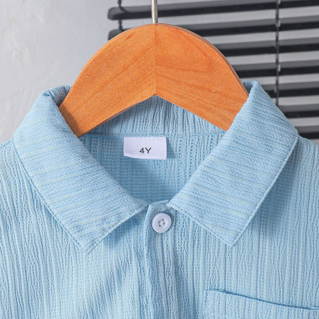 Boy's stylish gentleman's summer outfit in college style